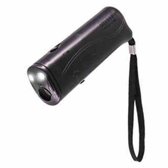 Handheld ultrasonic dog repellent device with wrist strap.